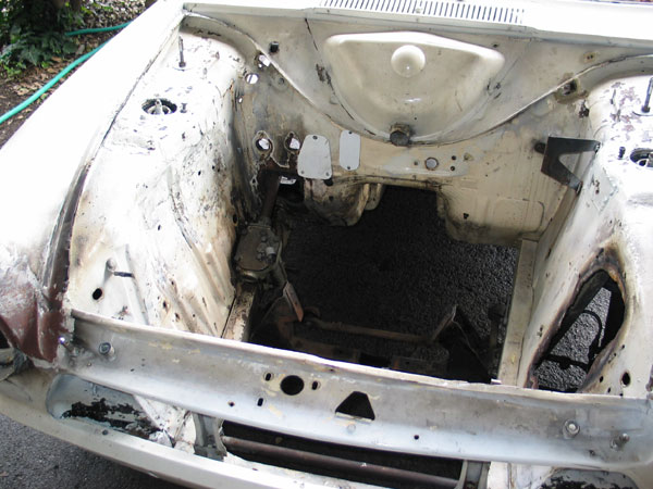 note damaged inner fenders...